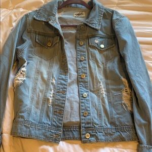 ripped blue jean jacket